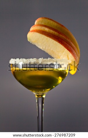 The apple liquor on a dark background