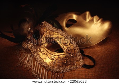 golden venetian masks on a textile