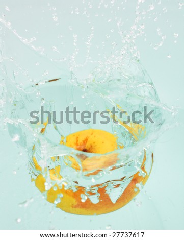 apple falling in water  ,blur in moving