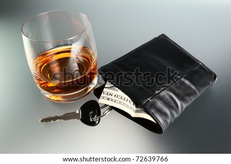 Whisky,money and key from car.