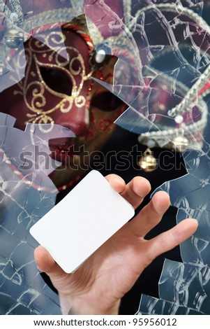 Man in a mask with card , place your image on card.
