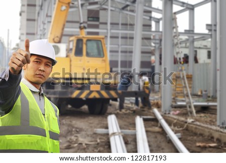 foreman construction site with construction background and worker