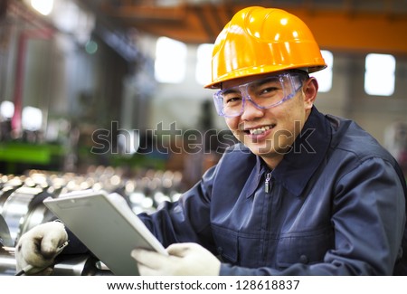 Portrait Asian Engineer With Checklist Look On You Camera