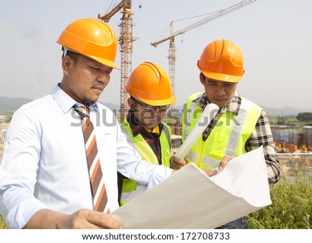 Construction worker team work discussion on location