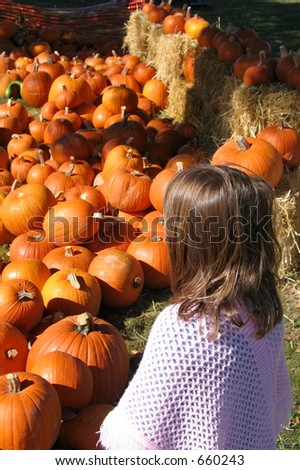 Picking her pumpkin