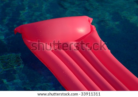 pool  with pink air bed