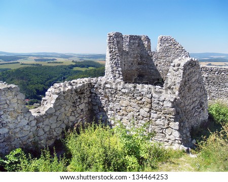 Ruined interior walls of the Castle of Cachtice during summer. This castle is situated in mountains above Cachtice village. The Castle of Cachtice was residence of the world famous Elizabeth Bathory.