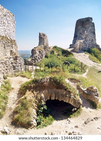 Summer view of partially ruined interior and entrance to the catacombs of famous Castle of Cachtice. The Castle of Cachtice was residence of the world famous Elizabeth Bathory.