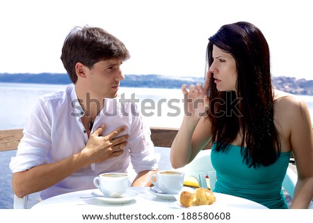 Angry woman telling husband to be quiet and not talk