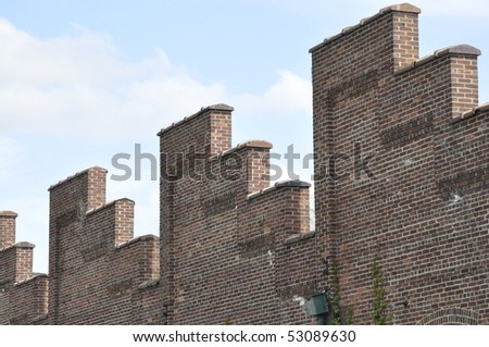 SIDE OF BUILDING FACTORY, STEPPED BRICKS