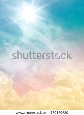 Billowing And Wispy Clouds With A Sunburst Light Effect. Image Displays Soft, Pastel Colors And A Paper Grain And Texture At 100 Percent.