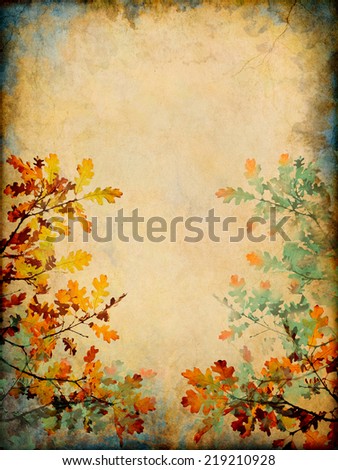 Autumn leaves on a grunge paper background.  Image displays a distinct paper grain and texture at 100 percent.