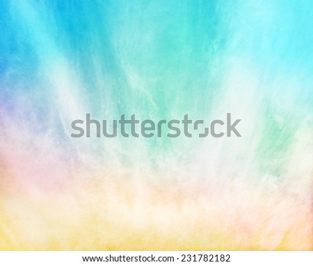 Multi-colored fog and clouds on a textured paper background.  Image displays a pleasing paper grain and texture at 100 percent.