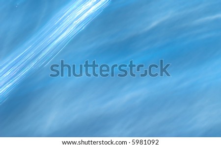 A textured, blue water background with blurred motion.