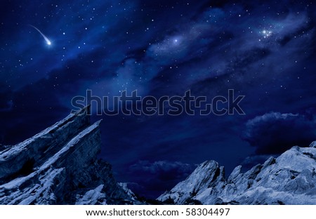 A desert landscape at night with moonlight and stars.
