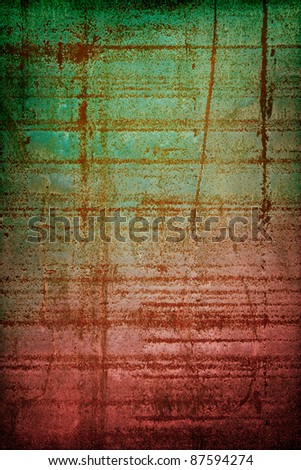 An old and rusted steel background with grunge rust patterns and a green to red gradient.