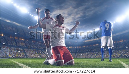 Soccer players celebrate a victory during a soccer game on a professional outdoor soccer stadium. They wear unbranded soccer uniform. Stadium and crowd are made in 3D.