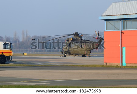 Eelde, Holland 13-03-2014: Royal Navy Sea King Mk4 (HC4) Helicopter on commercial airfield Groningen airport Eelde.