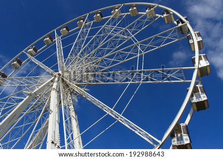 GRONINGEN - MAY 15: Ferris wheel on a beautiful day at the fair ground on may 15 2014 in Groningen, Netherlands.