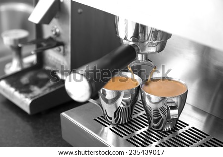 Making two espressos on stainless steel home espresso machine.