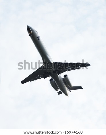 Flight of the plane in the dark blue sky