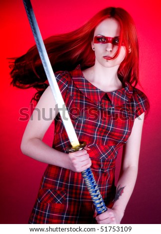 red hair japan. stock photo : Girl with red hair and a Japanese sword