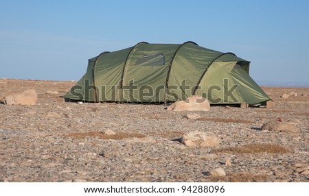 Modern tent in the stony desert