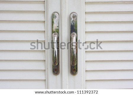 The old rusty key is sitting in the door eye.