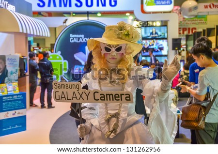 BANGKOK, THAILAND - DECEMBER 1: Samsung promotes Samsung Galaxy camera in Thailand Photo Fair with a doll-girl mascot on December 1, 2012 in Bangkok.