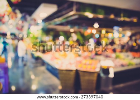 Blur background photograph of colorful supermarket in the department store building in vintage color