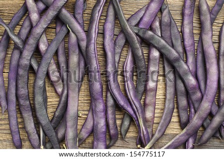 Background with purple string beans