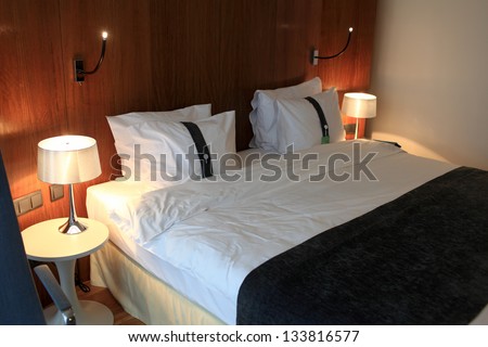 It is interior of hotel room at night