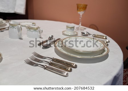 Cutlery on the round table in a restaurant