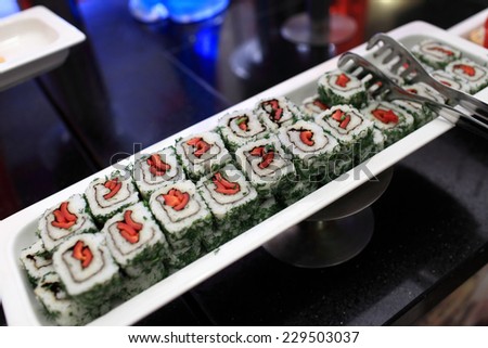Set of sushi on a plate at the buffet