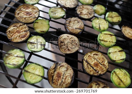 Cooking of eggplant and zucchini on the barbecue grill