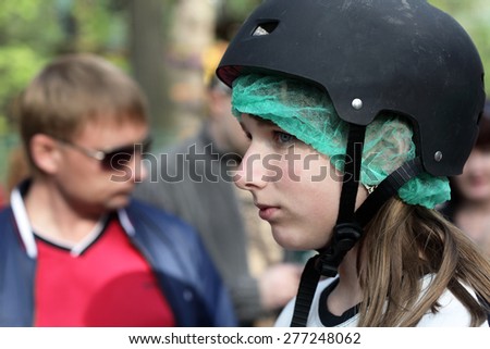 Profile girl face in the black helmet