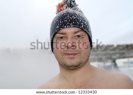 The man outdoor after winter swimming, Siberia