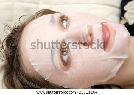 The woman with a face pack, close-up