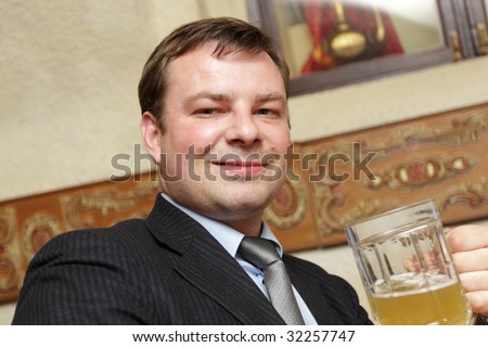 The manager resting after work in a beer restaurant
