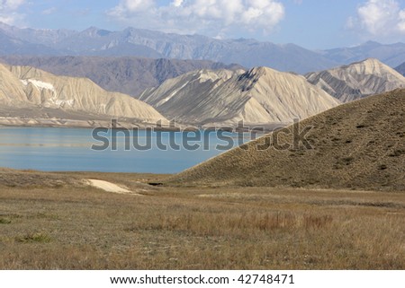 Toktogul Reservoir, located in the Jalal-Abad Province of Kyrgyzstan, is the largest of the reservoirs on the path of the Naryn River. Bishkek - Osh road