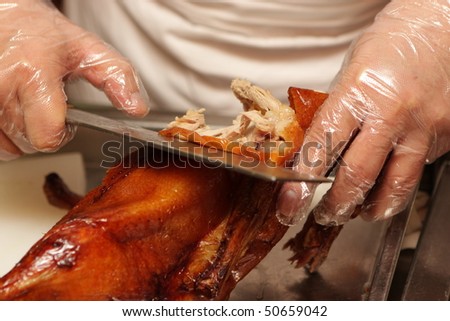 Preparation of peking Duck. Peking Duck is a famous duck dish from Beijing that has been prepared since the imperial era, and is now considered one of China\'s national foods.