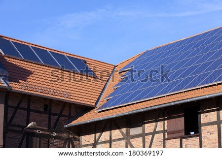 Alternative energy photovoltaic solar panels on the roof of a Agricultural Building
