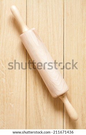 Rolling pin made of wood on a table