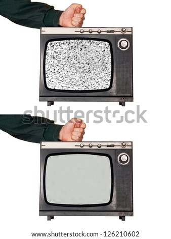 Clenched fist strikes broken retro vintage TV. No signal noise at screen.