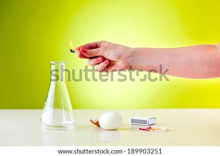 egg drawn by under-pressure into bottle