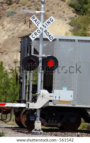 Railroad Crossing with Passing Train