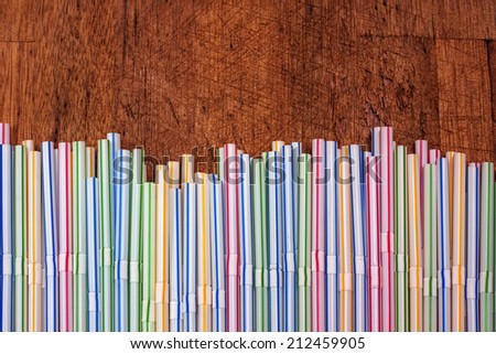Background of Striped drink straws in different colors