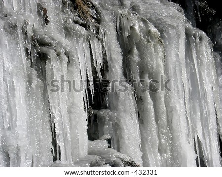 Frozen water The icicles wall from frozen falling water due to extremely low temperatures in the mountains