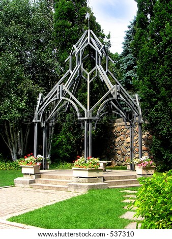The castle arbor. The build from metal profiles garden house for taking rest in the garden.