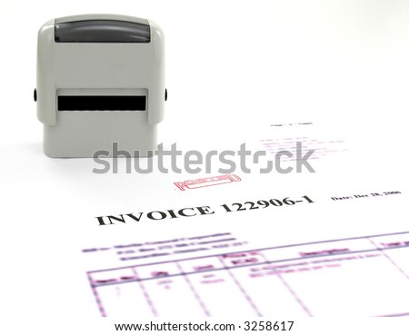 Invoice posted. Represent paper copy of computer invoice mark up for document turn “POSTED” and the stamps used for stamping of invoices.